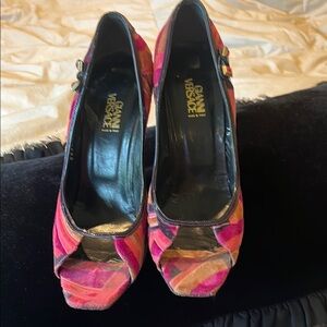 Nice condition Gianni Versace size 37 1/2.  Velvet detail, open toe heel.
